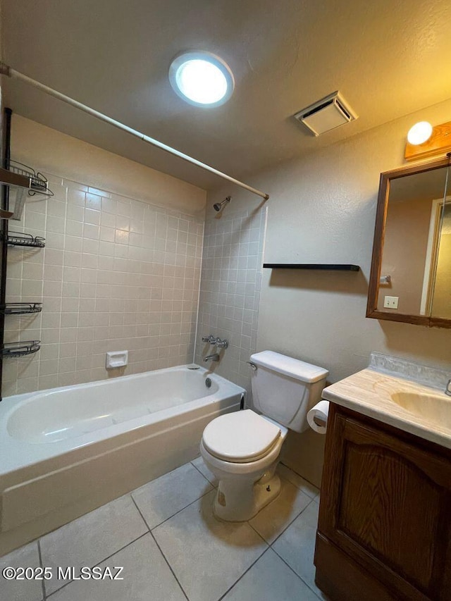 3873 N Pasatiempo Pl, Tucson, AZ 85705 - bathroom featuring bathing tub / shower combination, tile patterned flooring, toilet, and vanity