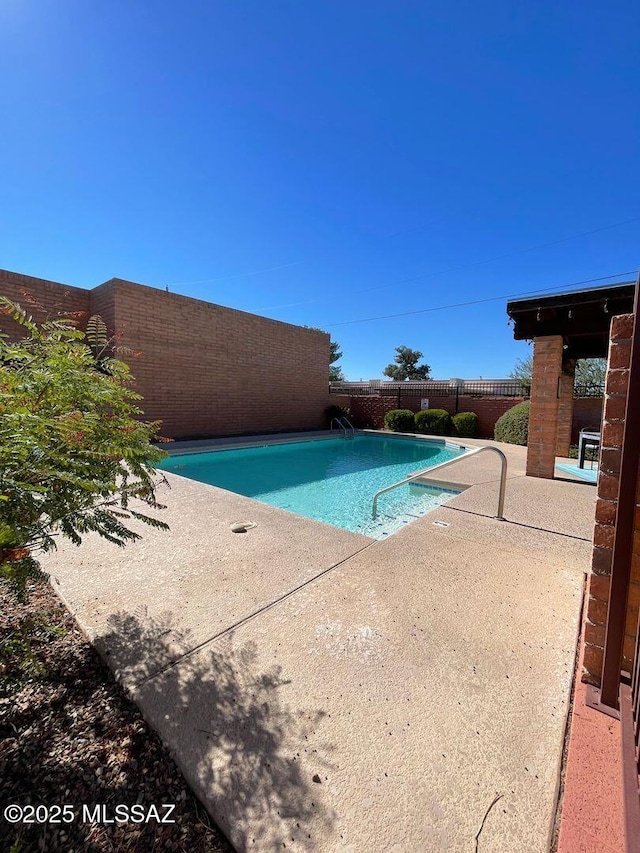 3873 N Pasatiempo Pl, Tucson, AZ 85705 - view of pool with a fenced backyard and a patio area