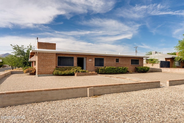5301 E 4th St, Tucson, AZ 85711 - single story home featuring brick siding