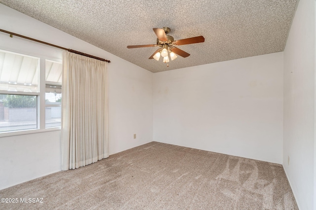 5301 E 4th St, Tucson, AZ 85711 - unfurnished room with carpet flooring, a ceiling fan, and a textured ceiling