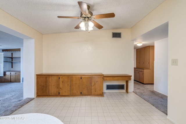 5301 E 4th St, Tucson, AZ 85711 - spare room with light carpet and a ceiling fan