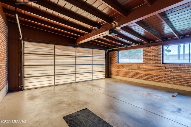 5301 E 4th St, Tucson, AZ 85711 - garage featuring wooden ceiling and a garage door opener