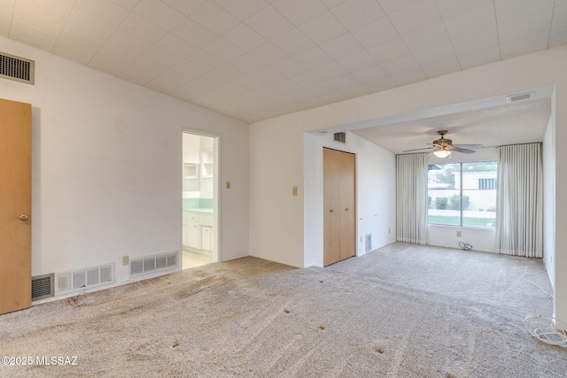 5301 E 4th St, Tucson, AZ 85711 - empty room with carpet flooring and ceiling fan
