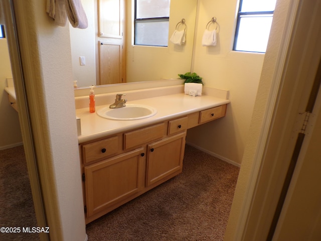 6655 N Canyon Crest Dr Unit 19201, Tucson, AZ 85750 - bathroom with vanity and carpet