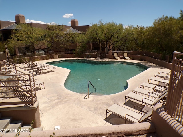 6655 N Canyon Crest Dr Unit 19201, Tucson, AZ 85750 - community pool featuring a patio area