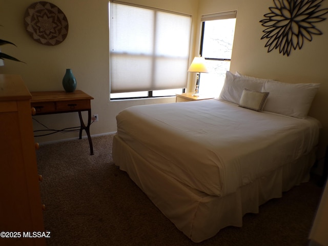 6655 N Canyon Crest Dr Unit 19201, Tucson, AZ 85750 - bedroom featuring carpet flooring and baseboards