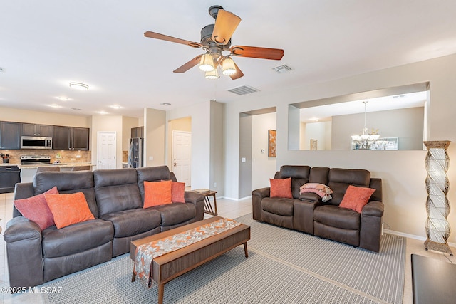 10487 S Cutting Horse Dr, Vail, AZ 85641 - living room featuring a chandelier, baseboards, and a ceiling fan
