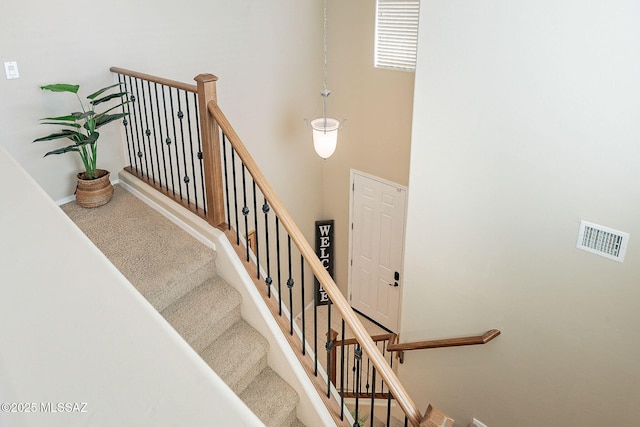 10487 S Cutting Horse Dr, Vail, AZ 85641 - staircase featuring a towering ceiling
