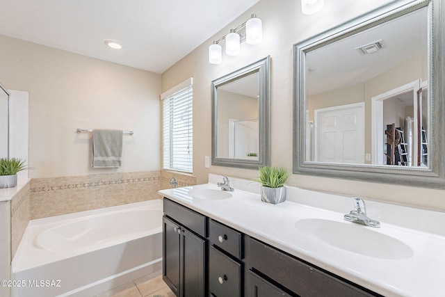 10487 S Cutting Horse Dr, Vail, AZ 85641 - full bathroom with a bath, tile patterned flooring, and double vanity