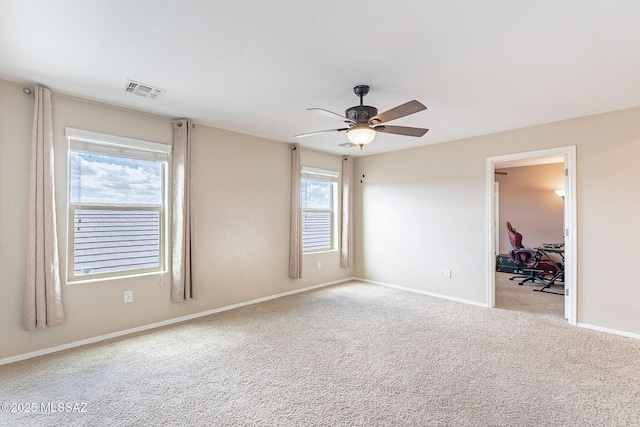10487 S Cutting Horse Dr, Vail, AZ 85641 - carpeted empty room with a ceiling fan and baseboards