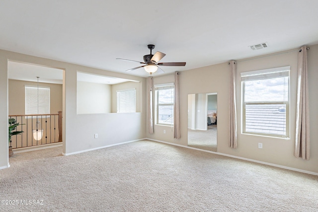 10487 S Cutting Horse Dr, Vail, AZ 85641 - carpeted empty room featuring a ceiling fan and baseboards