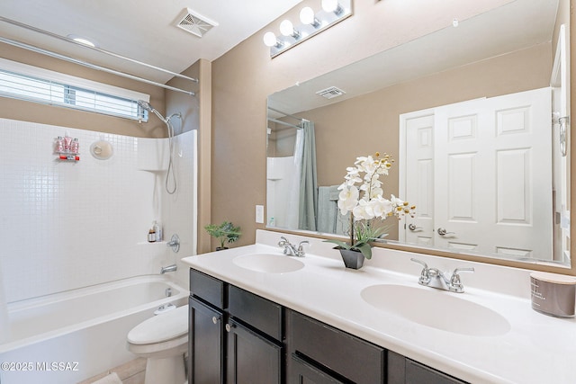 10487 S Cutting Horse Dr, Vail, AZ 85641 - full bath featuring shower / bath combination with curtain, toilet, and double vanity