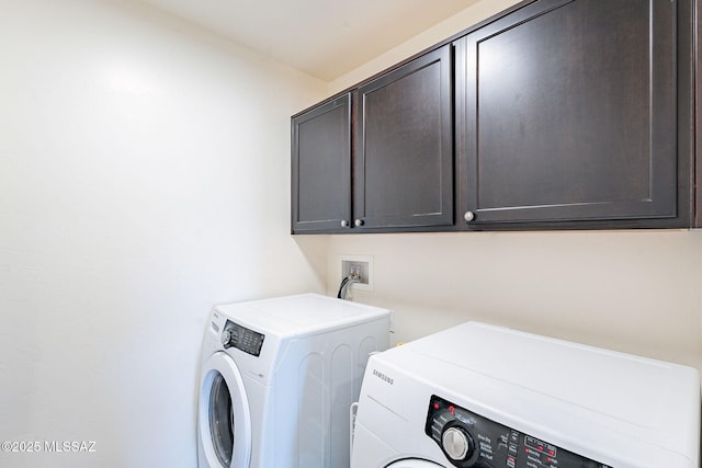 10487 S Cutting Horse Dr, Vail, AZ 85641 - laundry room featuring washer and clothes dryer and cabinet space