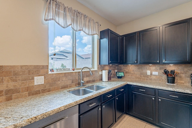 10487 S Cutting Horse Dr, Vail, AZ 85641 - kitchen with a sink, dishwasher, tasteful backsplash, and light tile patterned flooring