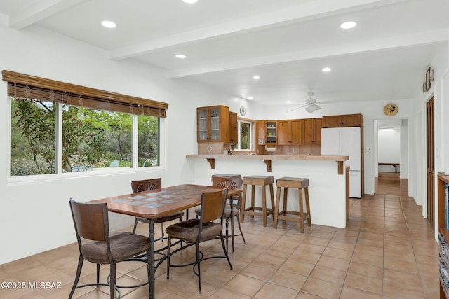 4921 E Camino De Los Olivos, Tucson, AZ 85718 - dining room with beam ceiling, recessed lighting, light tile patterned flooring, and ceiling fan