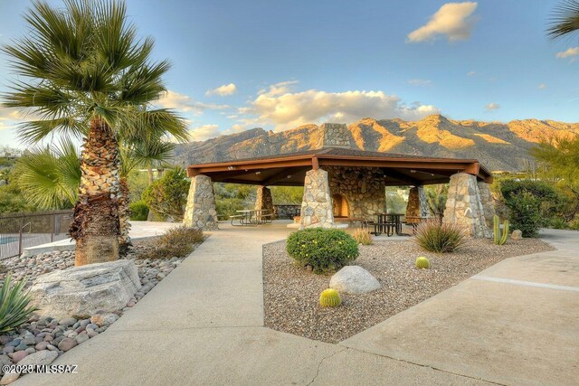 4921 E Camino De Los Olivos, Tucson, AZ 85718 - view of home's community featuring a mountain view, a patio, and fence
