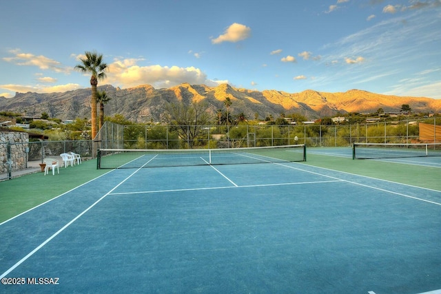 4921 E Camino De Los Olivos, Tucson, AZ 85718 - view of tennis court featuring a mountain view and fence