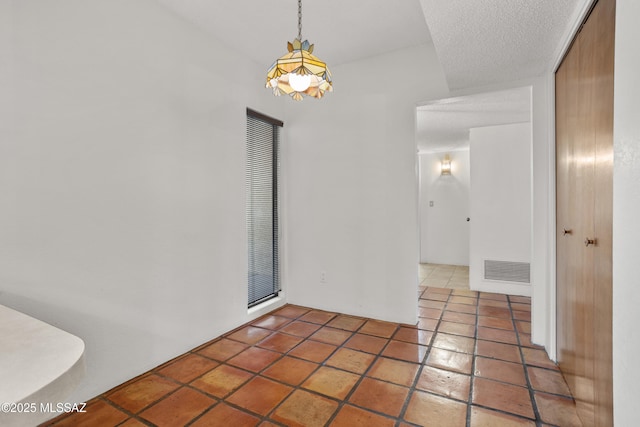 9350 E Speedway Blvd Unit 6, Tucson, AZ 85710 - unfurnished dining area featuring a heating unit