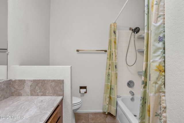 9350 E Speedway Blvd Unit 6, Tucson, AZ 85710 - bathroom with vanity, shower / tub combo, toilet, and tile patterned floors