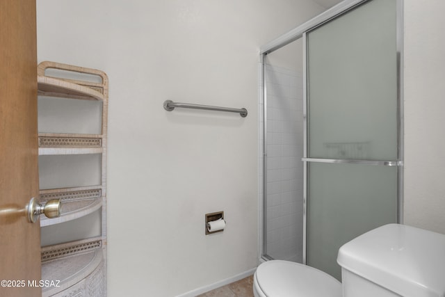 9350 E Speedway Blvd Unit 6, Tucson, AZ 85710 - full bathroom featuring toilet, tiled shower, tile patterned flooring, and baseboards
