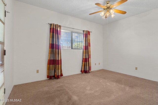 9350 E Speedway Blvd Unit 6, Tucson, AZ 85710 - carpeted spare room featuring a ceiling fan