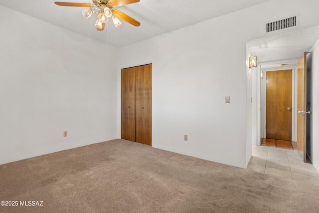 9350 E Speedway Blvd Unit 6, Tucson, AZ 85710 - spare room featuring light carpet and a ceiling fan