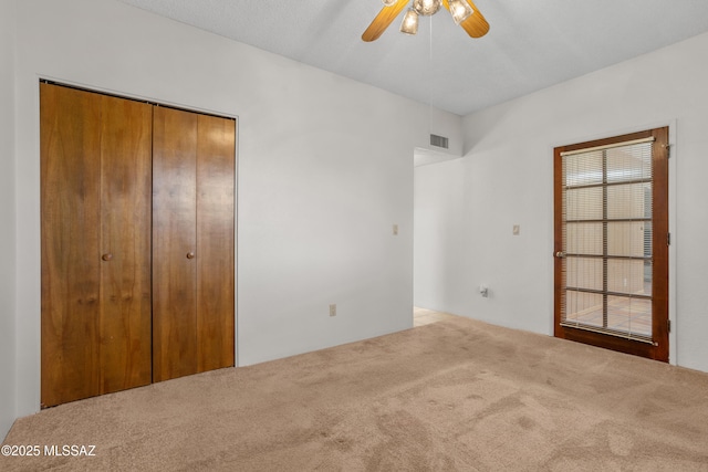 9350 E Speedway Blvd Unit 6, Tucson, AZ 85710 - unfurnished bedroom with carpet flooring and a ceiling fan