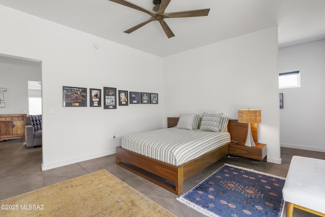 bedroom featuring baseboards, concrete flooring, and ceiling fan