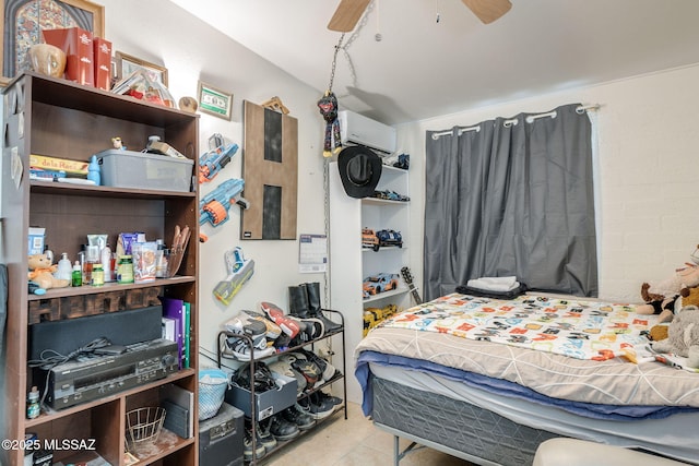 615 W 6th Ave, San Manuel, AZ 85631 - bedroom featuring tile patterned flooring, a wall unit AC, and a ceiling fan
