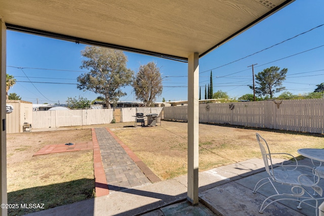 615 W 6th Ave, San Manuel, AZ 85631 - fenced backyard with a patio area