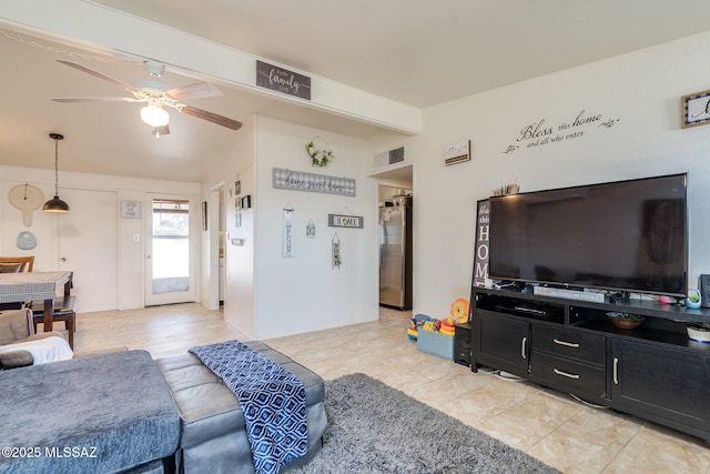 615 W 6th Ave, San Manuel, AZ 85631 - living room with a ceiling fan and light tile patterned floors