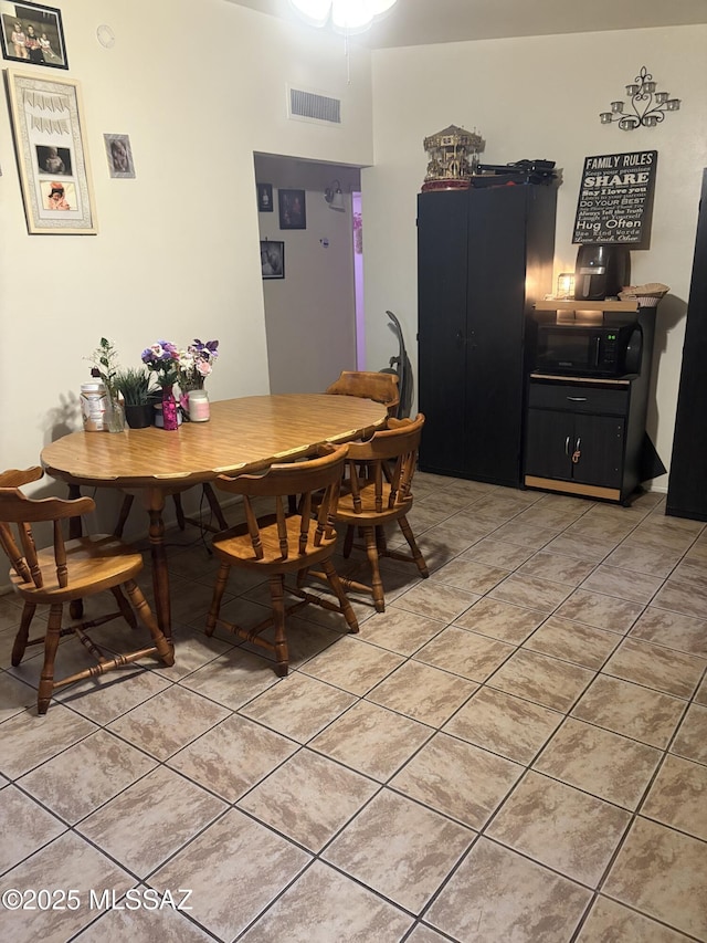 4416 N Pomona Ave, Tucson, AZ 85705 - dining room with light tile patterned flooring