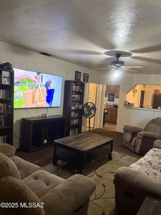 4416 N Pomona Ave, Tucson, AZ 85705 - living room featuring a ceiling fan