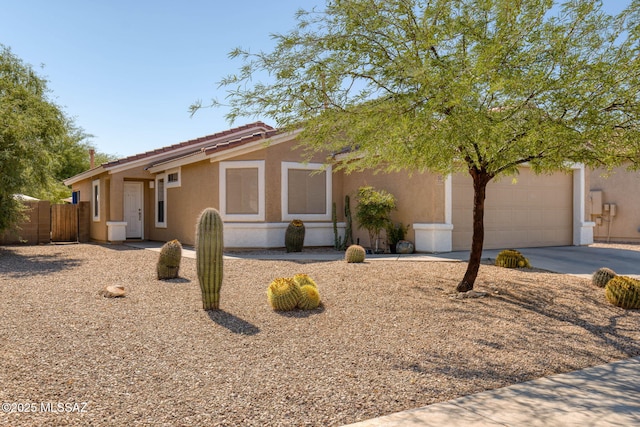 12356 N Globe Mallow Pl, Marana, AZ 85658 - single story home with a garage, stucco siding, driveway, and a tile roof