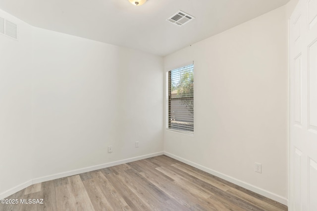 12356 N Globe Mallow Pl, Marana, AZ 85658 - unfurnished room featuring light wood-style floors