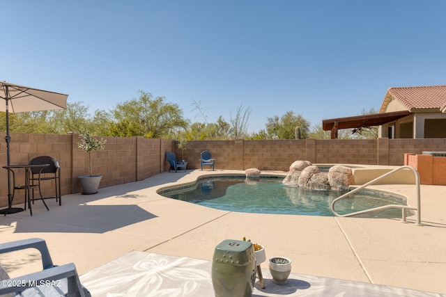 12356 N Globe Mallow Pl, Marana, AZ 85658 - view of pool featuring a patio area and a fenced backyard