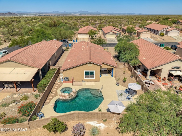 12356 N Globe Mallow Pl, Marana, AZ 85658 - view from above of property with a pool area and a mountainous background