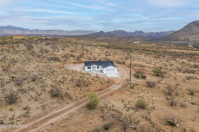 1895 Roma Ct, Rio Rico, AZ 85648 - aerial view of sparsely populated area with a mountain backdrop and a desert landscape