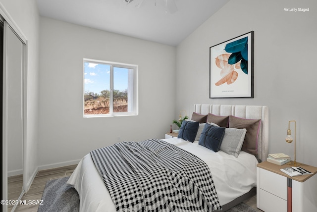 1895 Roma Ct, Rio Rico, AZ 85648 - bedroom featuring wood finished floors and baseboards
