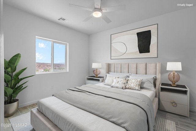 1895 Roma Ct, Rio Rico, AZ 85648 - bedroom featuring baseboards and ceiling fan
