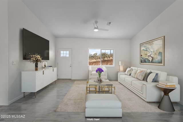 1895 Roma Ct, Rio Rico, AZ 85648 - living room with a ceiling fan, baseboards, and wood finish floors