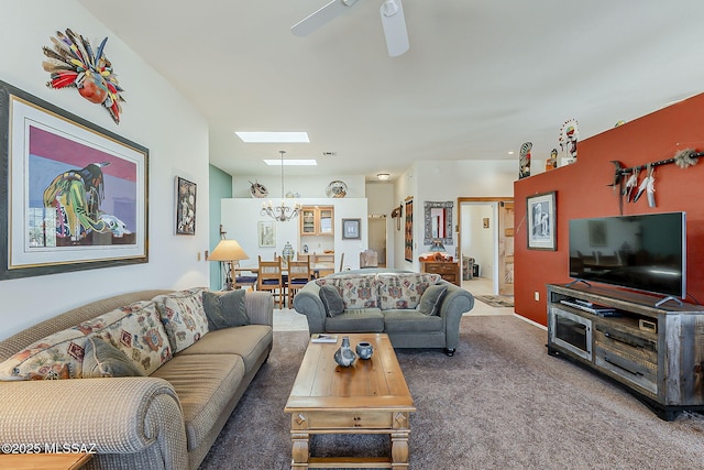 4043 S Golden Lynx Rd, Green Valley, AZ 85614 - living room with a skylight, carpet floors, and a ceiling fan