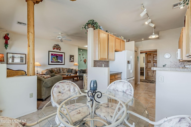 4043 S Golden Lynx Rd, Green Valley, AZ 85614 - dining space featuring a ceiling fan and light tile patterned floors