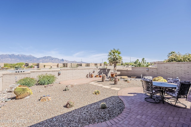 4043 S Golden Lynx Rd, Green Valley, AZ 85614 - view of patio featuring a mountain view and a fenced backyard