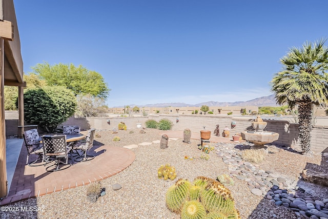 4043 S Golden Lynx Rd, Green Valley, AZ 85614 - fenced backyard featuring a mountain view and a patio area