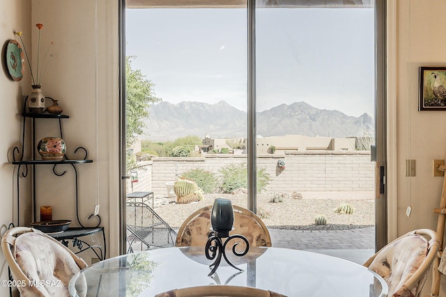 4043 S Golden Lynx Rd, Green Valley, AZ 85614 - dining area featuring a mountain view and healthy amount of natural light