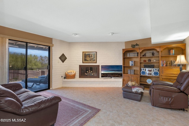 571 N Tanque Verde Loop Rd, Tucson, AZ 85748 - living area featuring tile patterned floors and a fireplace