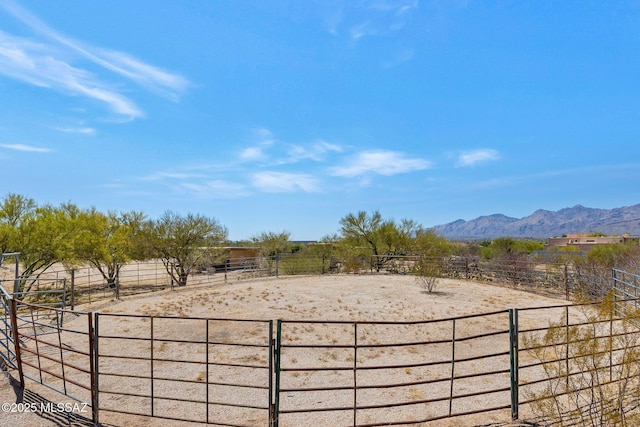 571 N Tanque Verde Loop Rd, Tucson, AZ 85748 - view of yard with an outdoor riding arena, a view of countryside, and a mountain view