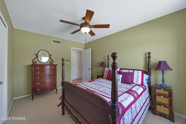 571 N Tanque Verde Loop Rd, Tucson, AZ 85748 - bedroom with light colored carpet, a ceiling fan, and a closet