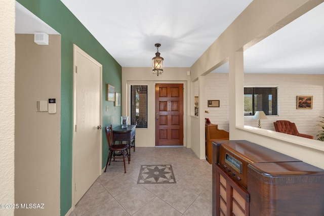 571 N Tanque Verde Loop Rd, Tucson, AZ 85748 - entryway featuring light tile patterned floors and baseboards